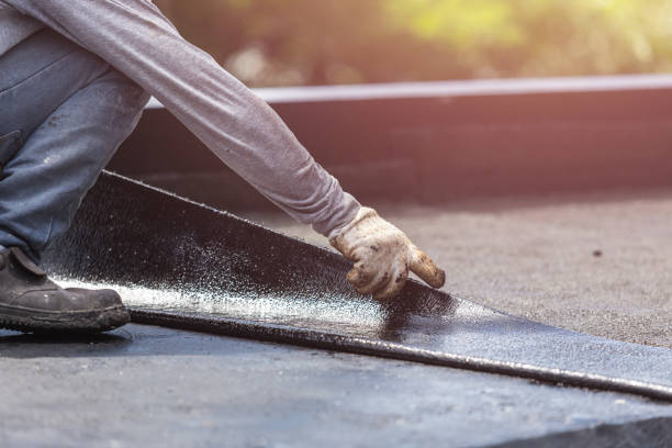Professional Waterproofing technician working in Davisburg, MI